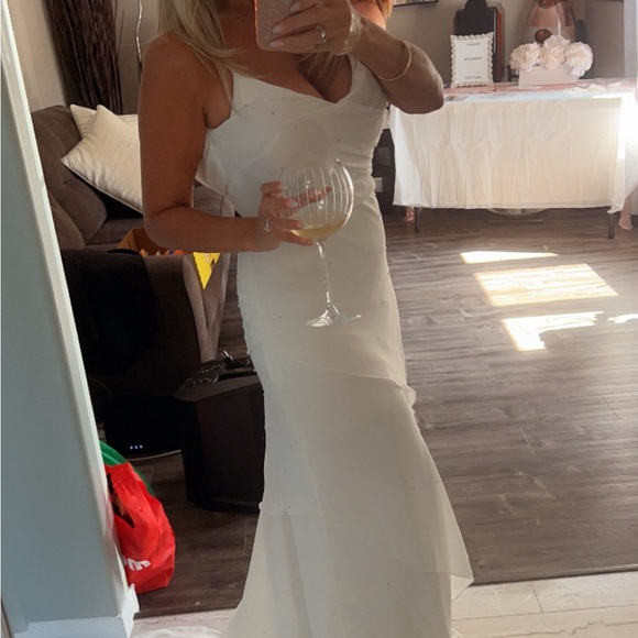 Size 12, taken in wedding dress ivory - Picture 1 of 3